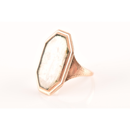 53 - An 18th century yellow gold mourning ring, the chamfered rectangular mount sent with an ivory plaque... 