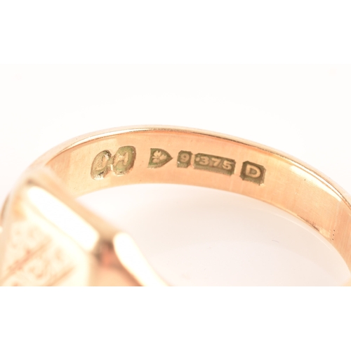 60 - A 9ct yellow gold signet ring, engraved with the initial M to plaque top, hallmarked to shank, size ... 