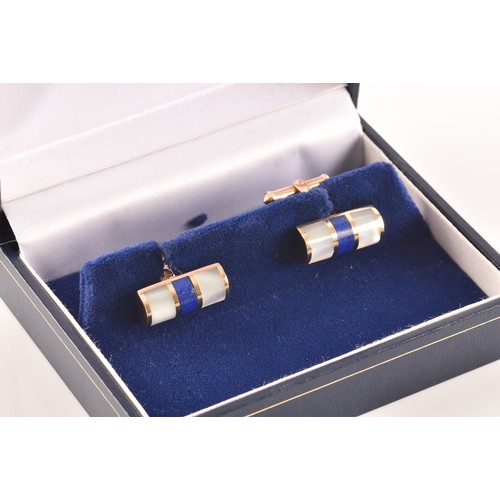 61 - A pair of 9ct yellow gold, lapis lazuli, and mother-of-pearl cufflinks, the smooth batons inlaid wit... 