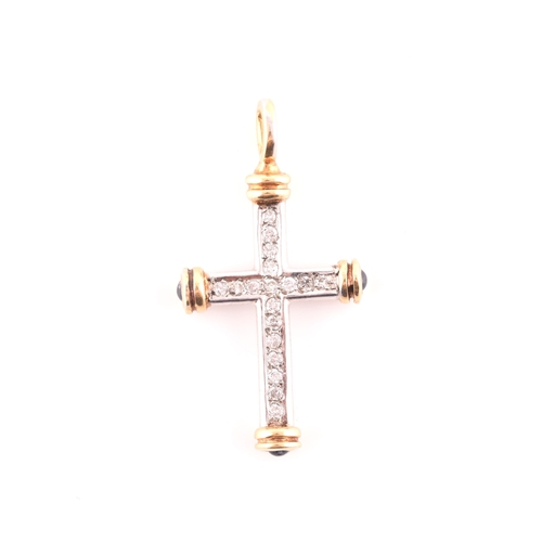 67 - An 18ct gold, diamond, and sapphire cross, the white gold cross mount inset with round brilliant-cut... 