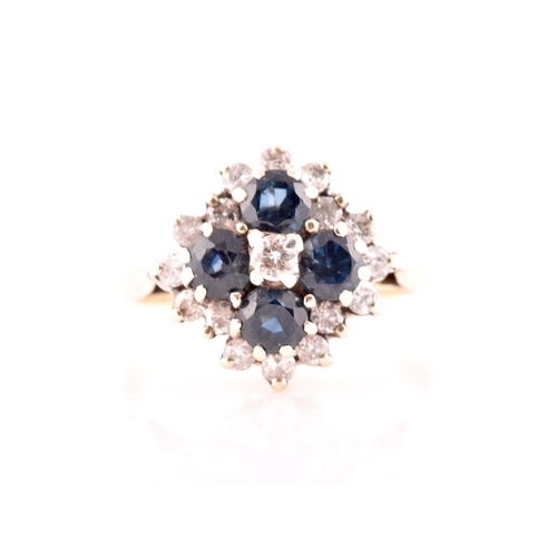 69 - An 18ct yellow gold, diamond, and sapphire quatrefoil cluster ring, set with four mixed round-cut sa... 