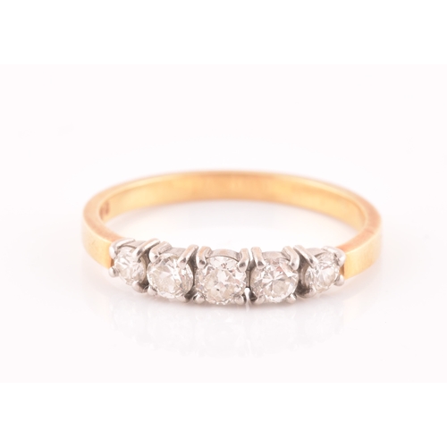 72 - An 18ct yellow gold and diamond ring, set with five graduated round-cut diamonds, the central diamon... 