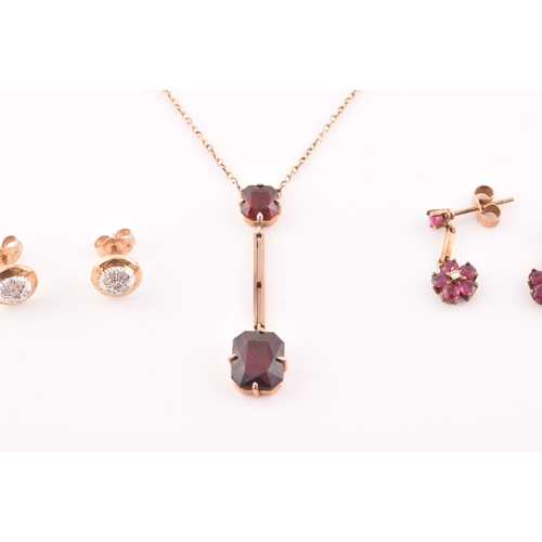 74 - An early 20th century 9ct yellow gold and garnet drop pendant necklace, together with a pair of yell... 