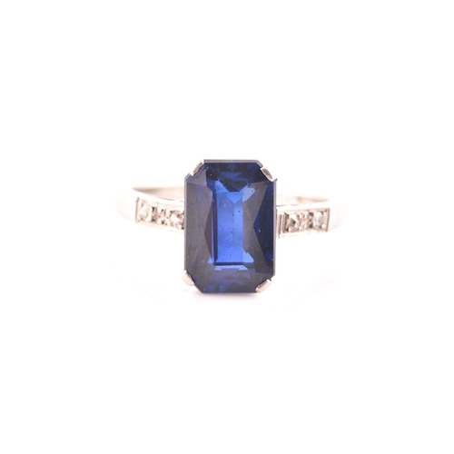 81 - An early 20th century platinum, diamond, and synthetic sapphire ring, set with a mixed rectangular-c... 