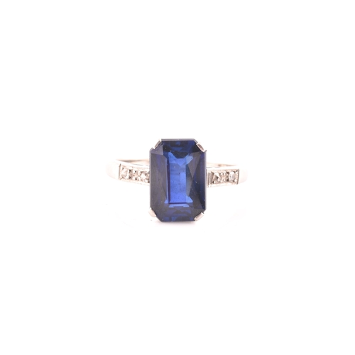 81 - An early 20th century platinum, diamond, and synthetic sapphire ring, set with a mixed rectangular-c... 