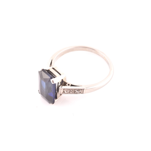 81 - An early 20th century platinum, diamond, and synthetic sapphire ring, set with a mixed rectangular-c... 