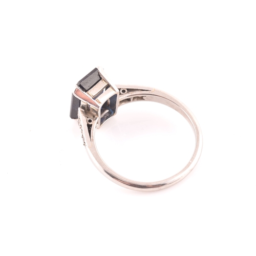 81 - An early 20th century platinum, diamond, and synthetic sapphire ring, set with a mixed rectangular-c... 