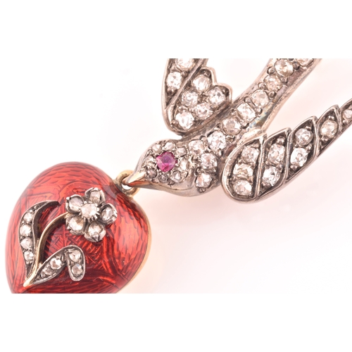 2 - A late Victorian diamond swallow brooch, the bird inset with old-cut diamonds, with a small ruby eye... 