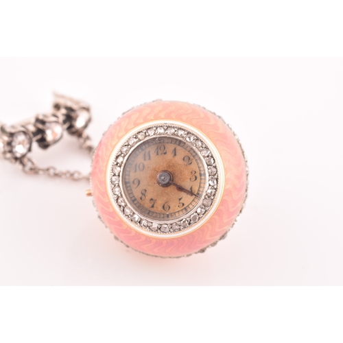 83 - A 19th century French pink guilloche enamel ball clock pendant, the Arabic numeral dial with old-cut... 