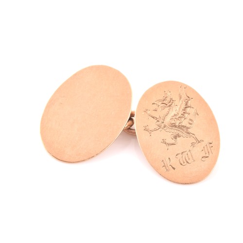 92 - A pair of 9ct yellow gold cufflinks, bearing a Welsh dragon and initials RWF, together with a 9ct ye... 