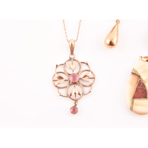 98 - A 9ct yellow gold Art Nouveau pendant, the openwork quatrefoil mount set with two pink tourmalines, ... 