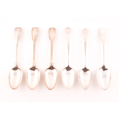 189 - A group of six silver serving spoons comprising: a set of three shell pattern fiddle and thread spoo... 