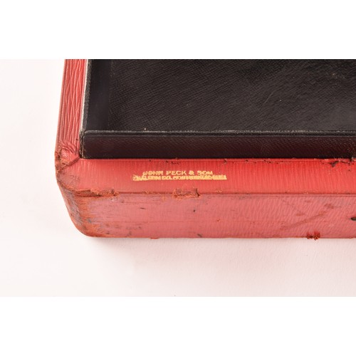 296 - A George VI red leather ministerial despatch box the lid embossed in gilt letters 'MINISTER OF FUEL ... 