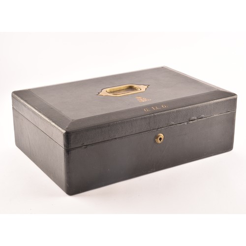 298 - A George V black leather despatch box the lid embossed in gilt letters 'G. LL. G', beneath an GRV ro... 