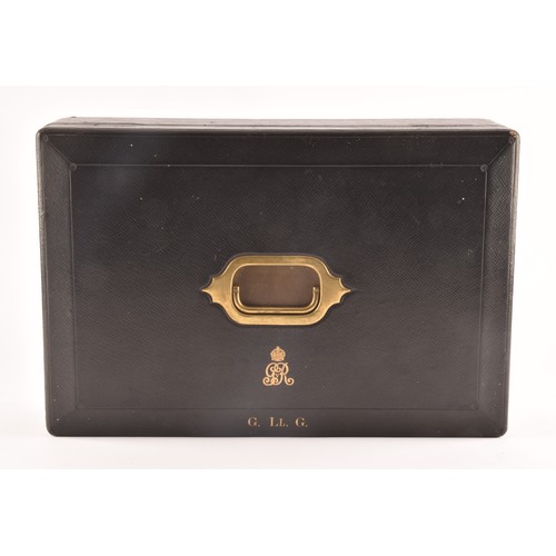 298 - A George V black leather despatch box the lid embossed in gilt letters 'G. LL. G', beneath an GRV ro... 