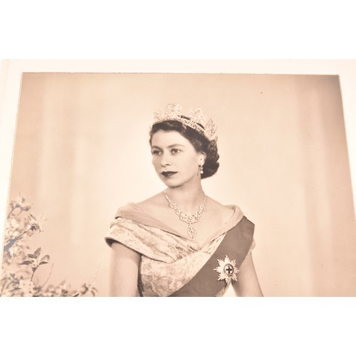 292 - A pair of signed photographs of Queen Elizabeth II and Prince Philip the Duke of Edinburgh, both sig... 