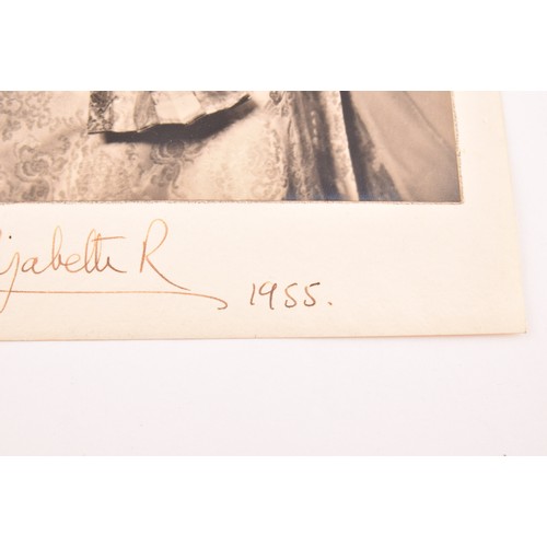 292 - A pair of signed photographs of Queen Elizabeth II and Prince Philip the Duke of Edinburgh, both sig... 