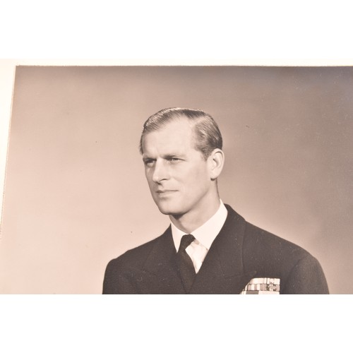 292 - A pair of signed photographs of Queen Elizabeth II and Prince Philip the Duke of Edinburgh, both sig... 