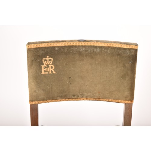 290 - A rare pair of Elizabeth II limed oak and velvet upholstered 1953 Coronation chairs, most likely fro... 