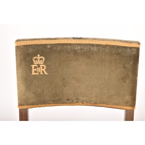 290 - A rare pair of Elizabeth II limed oak and velvet upholstered 1953 Coronation chairs, most likely fro... 