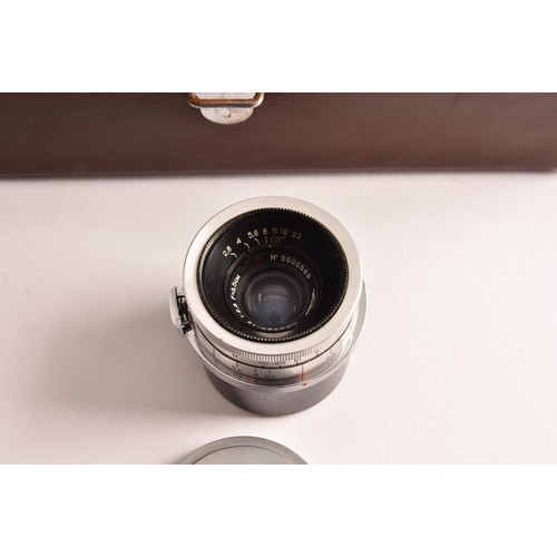 304 - A boxed Kiev 35mm camera and lens set of political interest, in a fitted box together with several l... 