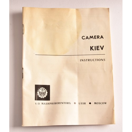 304 - A boxed Kiev 35mm camera and lens set of political interest, in a fitted box together with several l... 