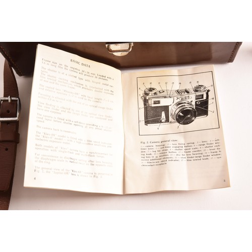 304 - A boxed Kiev 35mm camera and lens set of political interest, in a fitted box together with several l... 