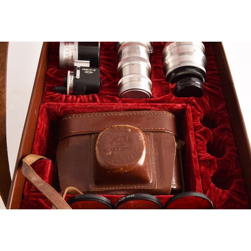 304 - A boxed Kiev 35mm camera and lens set of political interest, in a fitted box together with several l... 