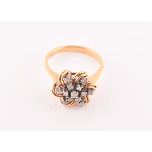 106 - A yellow gold and diamond floral starburst cluster ring, set with thirteen round-cut diamonds, with ... 