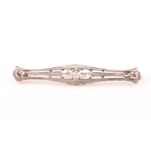 112 - A white and yellow metal bar brooch, in the Art Deco style, inset with a round brilliant-cut diamond... 