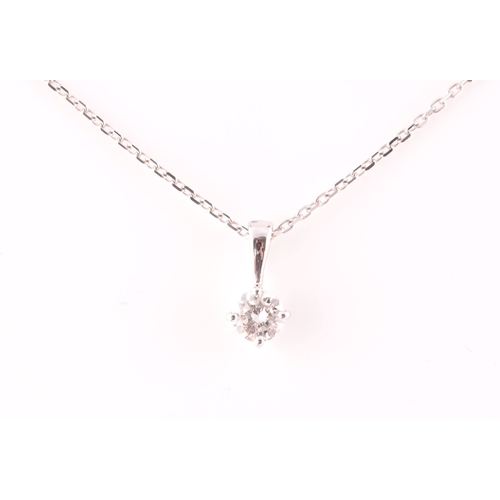 117 - A 9ct white gold mounted solitaire diamond pendant, of approximately 0.30 carats, suspended on a 9ct... 