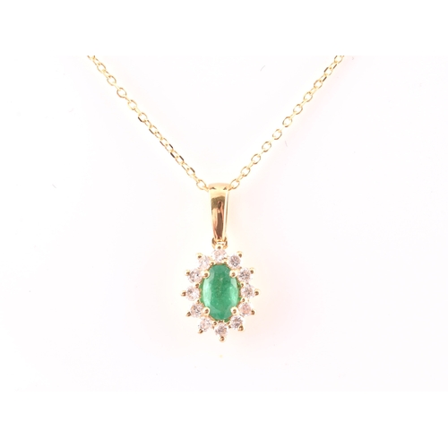 118 - An 18ct yellow gold, diamond, and emerald cluster pendant, set with a mixed oval-cut emerald, within... 