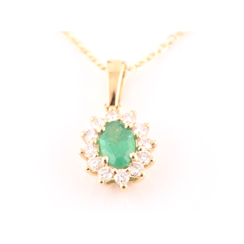 118 - An 18ct yellow gold, diamond, and emerald cluster pendant, set with a mixed oval-cut emerald, within... 