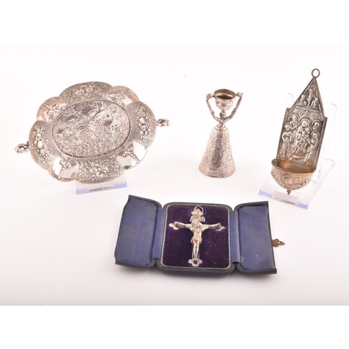 194 - A collection of four pieces of novelty and religious silver, including: a Victorian repose silver lo... 