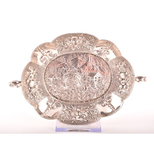 194 - A collection of four pieces of novelty and religious silver, including: a Victorian repose silver lo... 