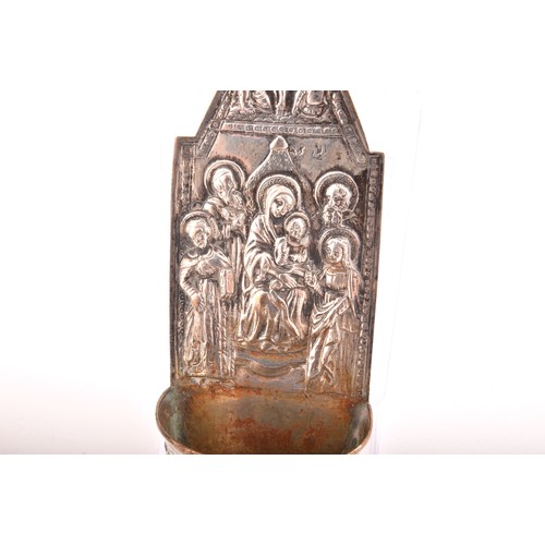 194 - A collection of four pieces of novelty and religious silver, including: a Victorian repose silver lo... 