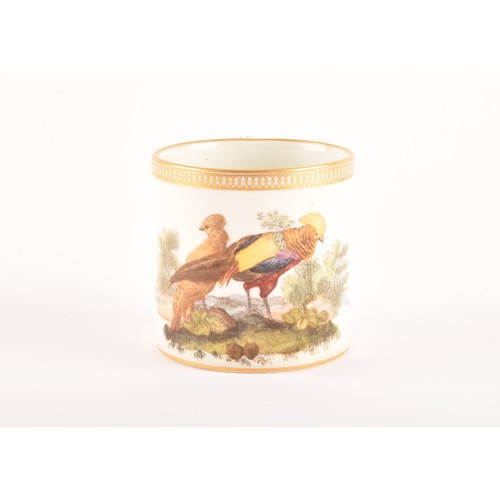 308 - A Meissen coffee can, c.1800, painted with a scene of a golden pheasant cock and hen bird in a lands... 