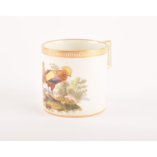 308 - A Meissen coffee can, c.1800, painted with a scene of a golden pheasant cock and hen bird in a lands... 