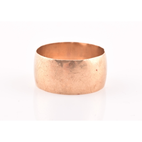 119 - A 9ct gold wide wedding band, size Y.