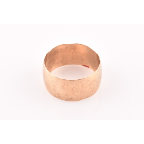 119 - A 9ct gold wide wedding band, size Y.