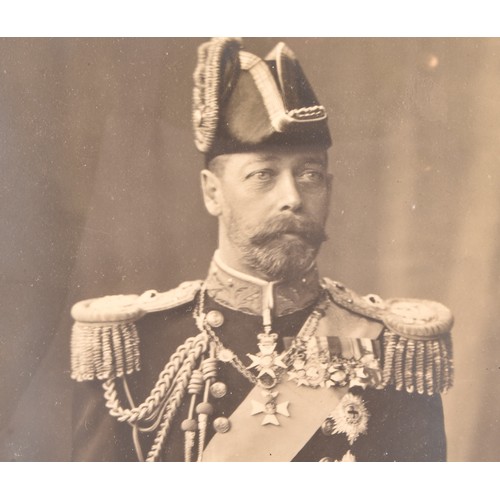 293 - King George V and Queen Mary, a pair of signed photographs of the King and Queen, each signed in ink... 