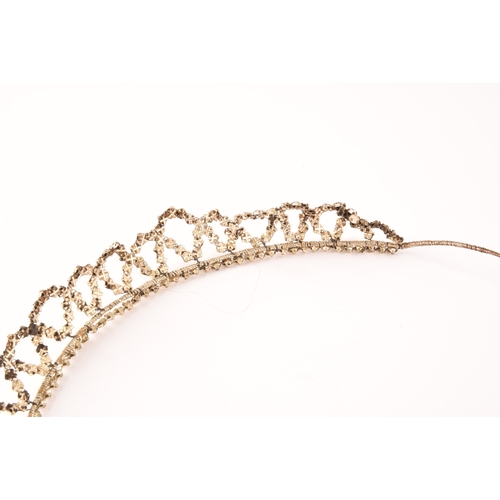 120 - A mid 20th century paste stone dress tiara, with gold mesh and paste stones set on a silver coloured... 