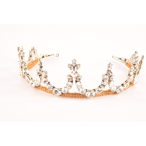 120 - A mid 20th century paste stone dress tiara, with gold mesh and paste stones set on a silver coloured... 