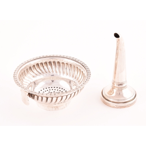 196 - A George lll silver wine funnel, hallmarked London 1820 by George Knight, with foliate rim and gadro... 