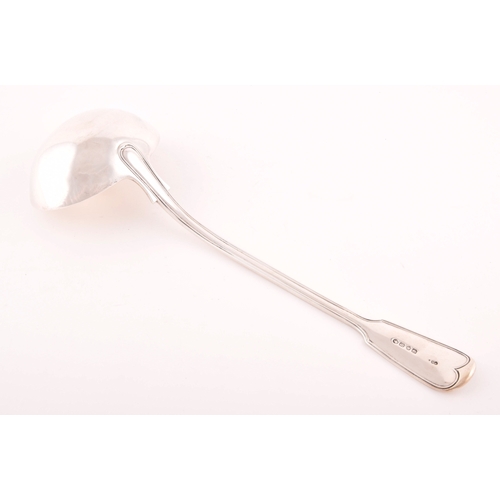 206 - A Victorian silver soup ladle, hallmarked London 1873 by George Adams, fiddle and thread pattern, wi... 