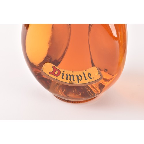 319 - A bottle of deluxe John Haig & Co Dimple old blended Scotch whisky, the bottle with decorative p... 