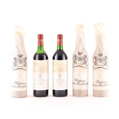 320 - Five bottles of 1993 Chateau Mouton Rothschild Pauillac red wine, the label featuring a design of a ... 