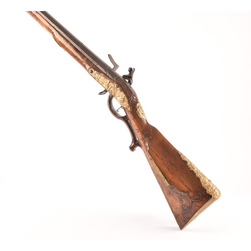 315 - A fine and rare 18th century Austrian flint lock rifle, with swamped damascus barrel, cylindrical ov... 