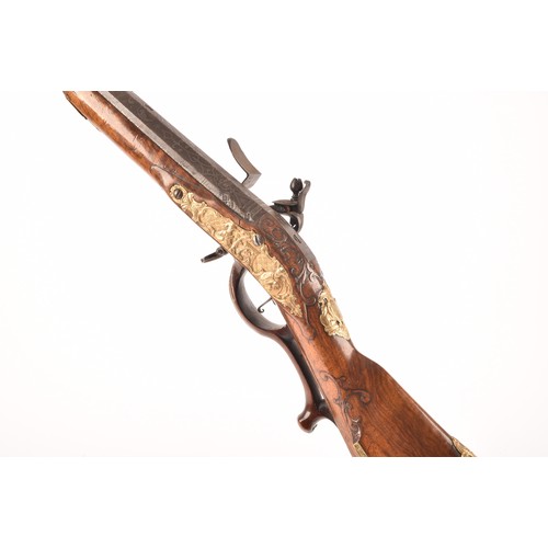 315 - A fine and rare 18th century Austrian flint lock rifle, with swamped damascus barrel, cylindrical ov... 