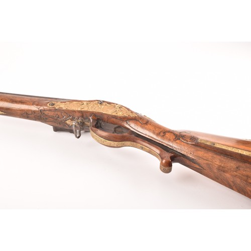 315 - A fine and rare 18th century Austrian flint lock rifle, with swamped damascus barrel, cylindrical ov... 